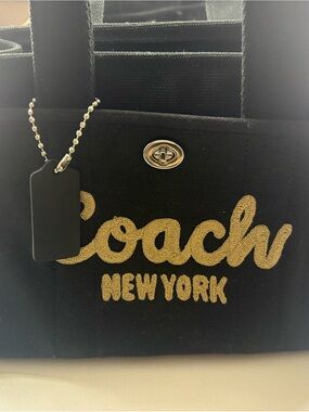 Coach Black Canvas Tote with Gold Script Logo
